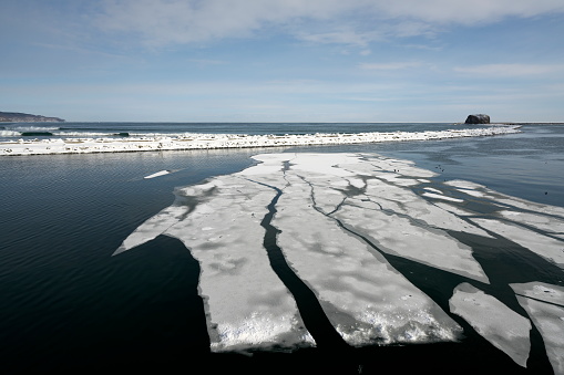 Hokkaido,Japan - February 15, 2023: Drift ice in the offing of the Abashiri port, Hokkaido, Japan