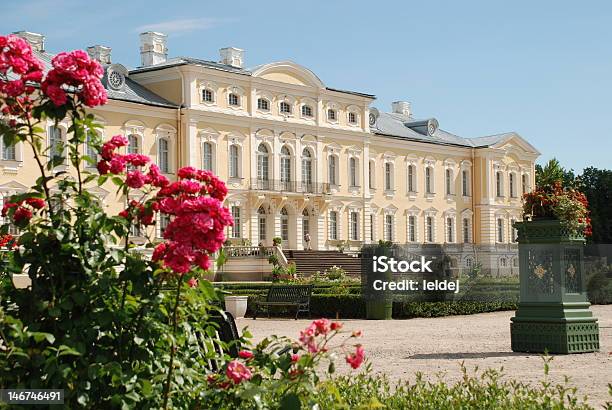 Beautiful Roses And Baroque Rococo Style Palace In Background Stock Photo - Download Image Now