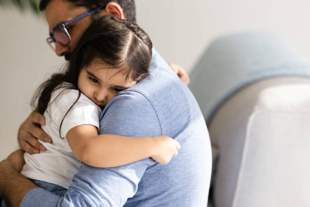 istock Father Consoling His Young Daughter 1467468896