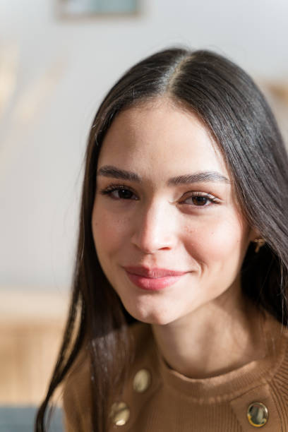 istock Young woman looking at camera 1467469583
