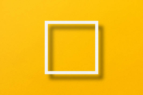 istock paper cut into square shapes with light and shadow placed on a yellow paper background 1467480489