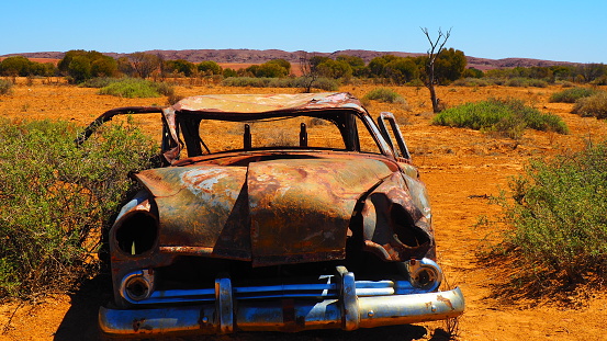Old abandoned Rusty car in the desert