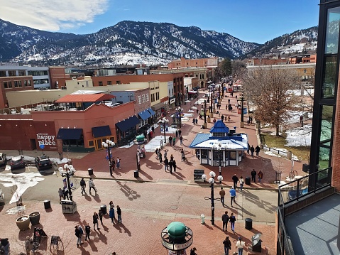 Boulder, Colorado, USA- February 18, 2023: Boulder, Colorado's Pearl Street downtown walking mall seen from above, with a nice crowd on a winter day.