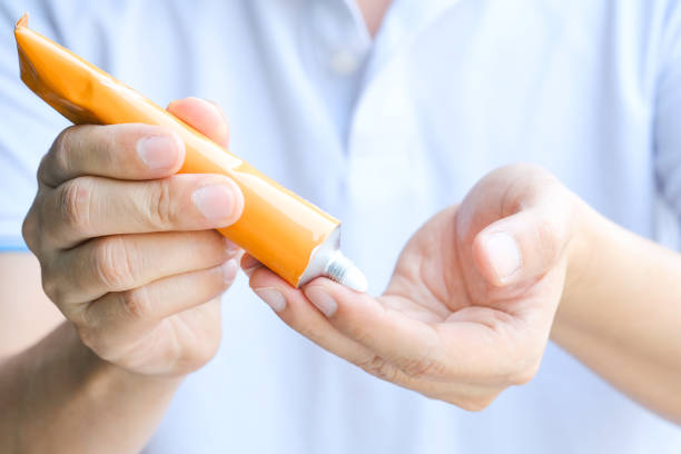 istock The woman's hand, she uses steroids Apply External type 1467487654
