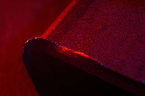 istock metal scraps. Macro. illuminated in red and blue. 1467498909