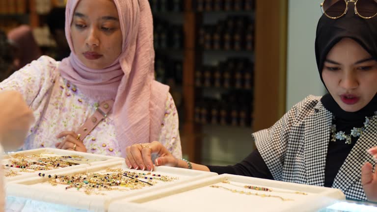 muslim women  choosing jewelry