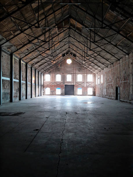 istock Dark industrial interior, hangar 1467504742