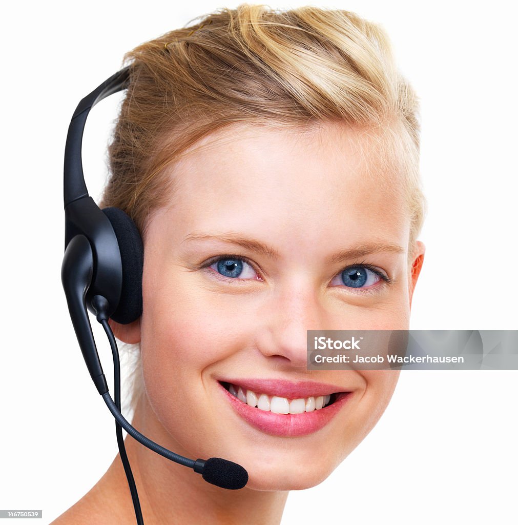 Close-up de um representante de atendimento ao cliente com fone de ouvido no fundo branco - Foto de stock de 20 Anos royalty-free