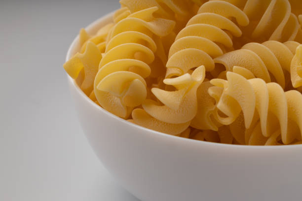 istock Macaroni and pasta in white bowl 1467506908