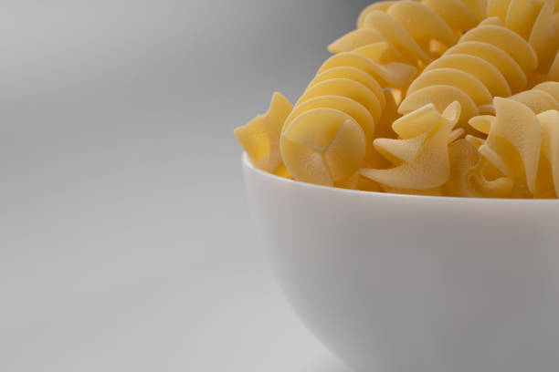 istock Macaroni and pasta in white bowl 1467506929