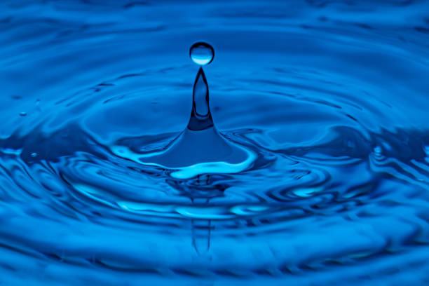 istock water drop splash in blue glass 1467508074