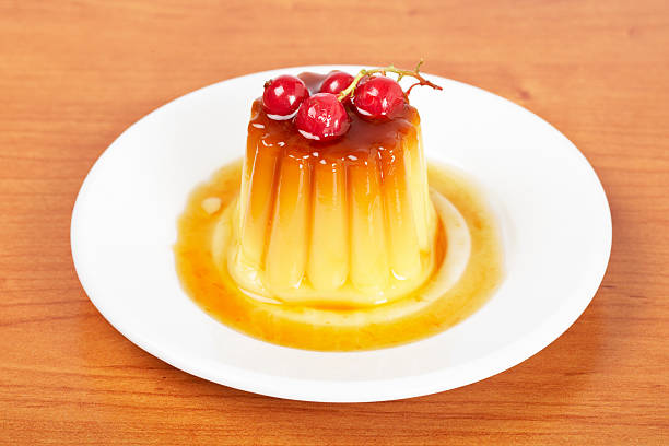 istock Cream caramel dessert with red currants 146750969