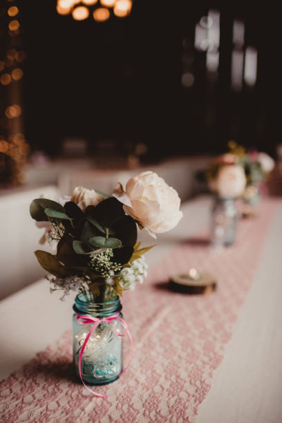 istock Wedding reception peony in a glass bell jar 1467510257
