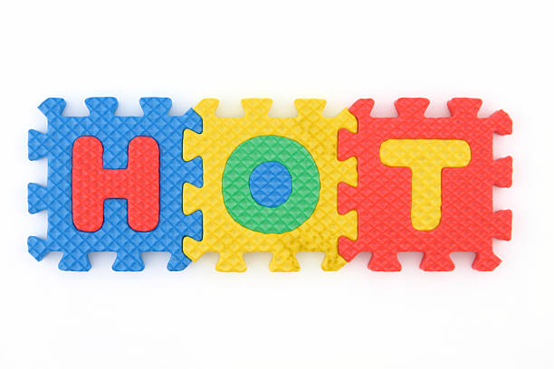 HOT word  with alphabet puzzle stock photo