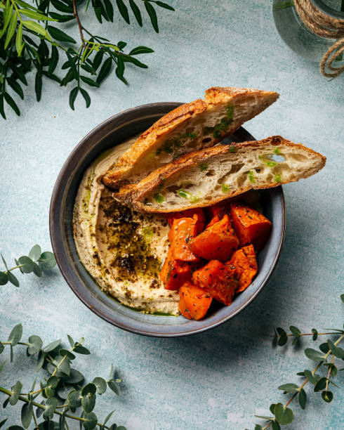 Hummus with honey pumpkin zaatar and crispy bucket