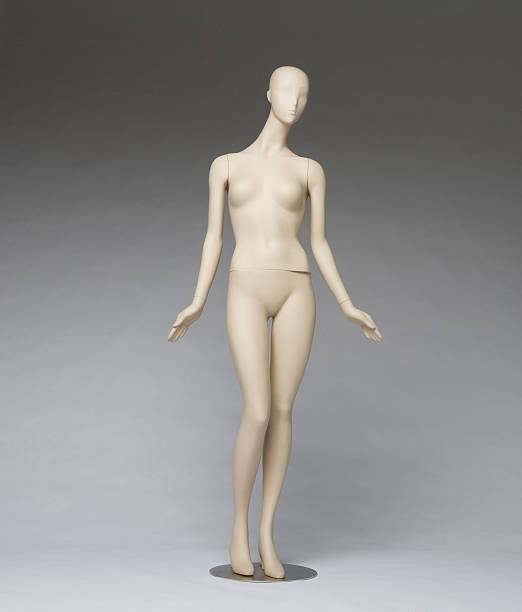 Mannequin on gray paper stock photo