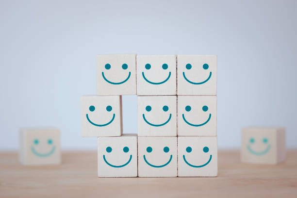 istock Best excellent business services rating customer experience, evaluation, Increase rating with Wooden blocks with the happy face smile face symbol on the table. Satisfaction survey concept. 1467526949