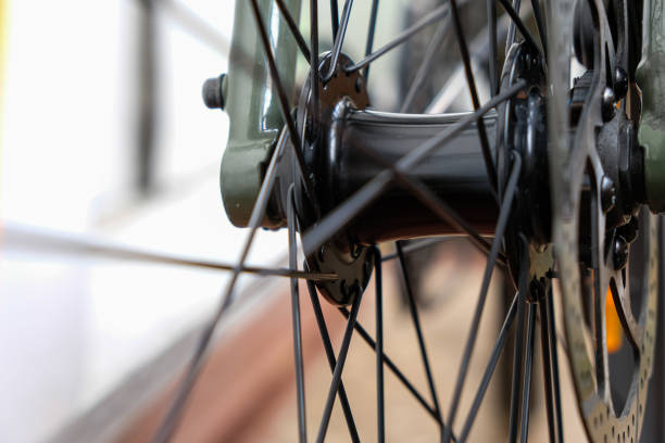 istock Bicycle front wheel hub. Attachment of bicycle spokes. 1467533642