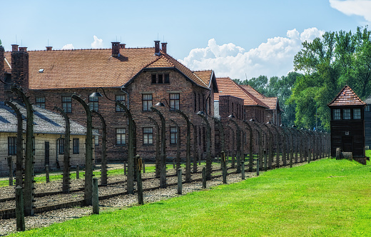 Auschwitz, Poland - November 15, 2019: The picture of the main gate to concentration camp- in Oswieciem, Poland.