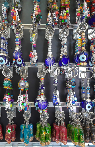 Keychains with beads from the evil eye are a popular tourist souvenir and a talisman from the evil eye, a symbol of protection from evil looks. Key chains with the inscription Alanya in Turkey