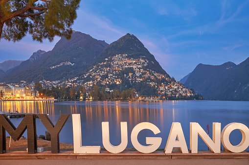 Night view on Lake Lugano in Switzerland.