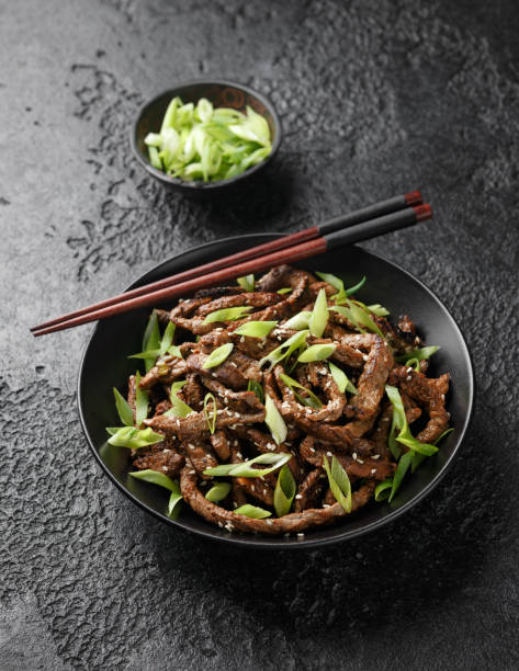 istock Korean beef Bulgogi BBQ with sesame seeds and spring onion. 1467543589