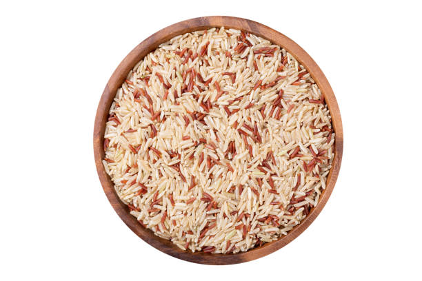 istock bowl of dry brown rice isolated on white background 1467545133