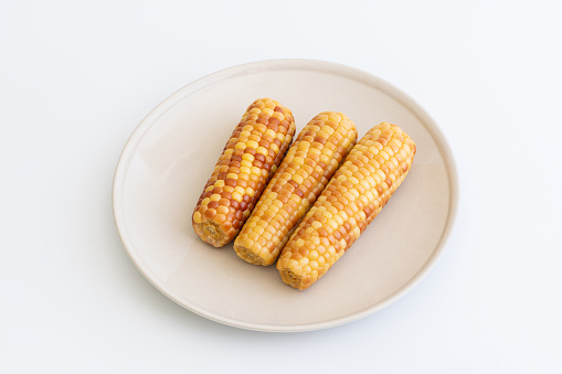 boiled corn on plate