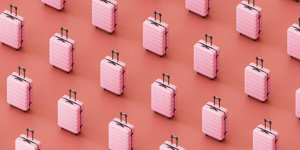 Similar pink suitcases against pink background. 3d render isometric view stock photo
