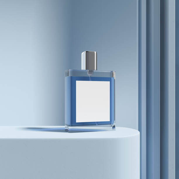 flacon de perfume na plataforma azul, maquete para exibição do produto - garrafinha - fotografias e filmes do acervo