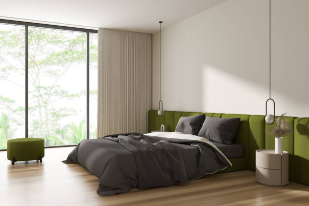 istock Corner view on bright bedroom interior with bed, bedsides 1467561070