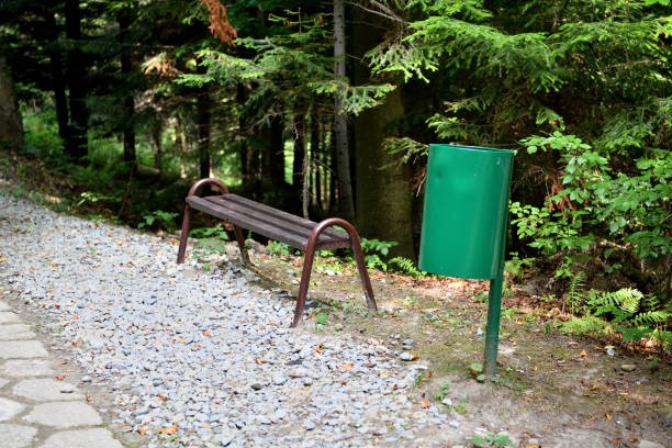 istock Green trash can for tourists in the forest 1467563395