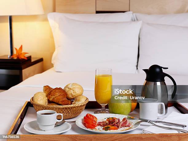 A Serving Tray With A Rich Breakfast On A Bed Stock Photo - Download Image Now - Apple - Fruit, Bed - Furniture, Bedroom