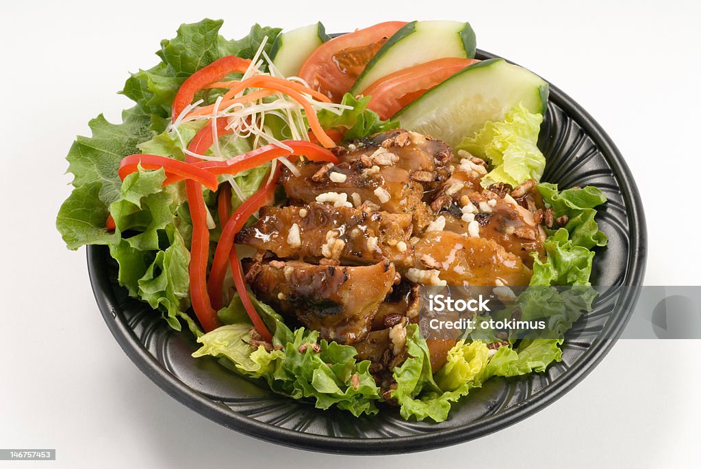 peanut glazed chicken peanut glazed chicken with a salad Baked Stock Photo