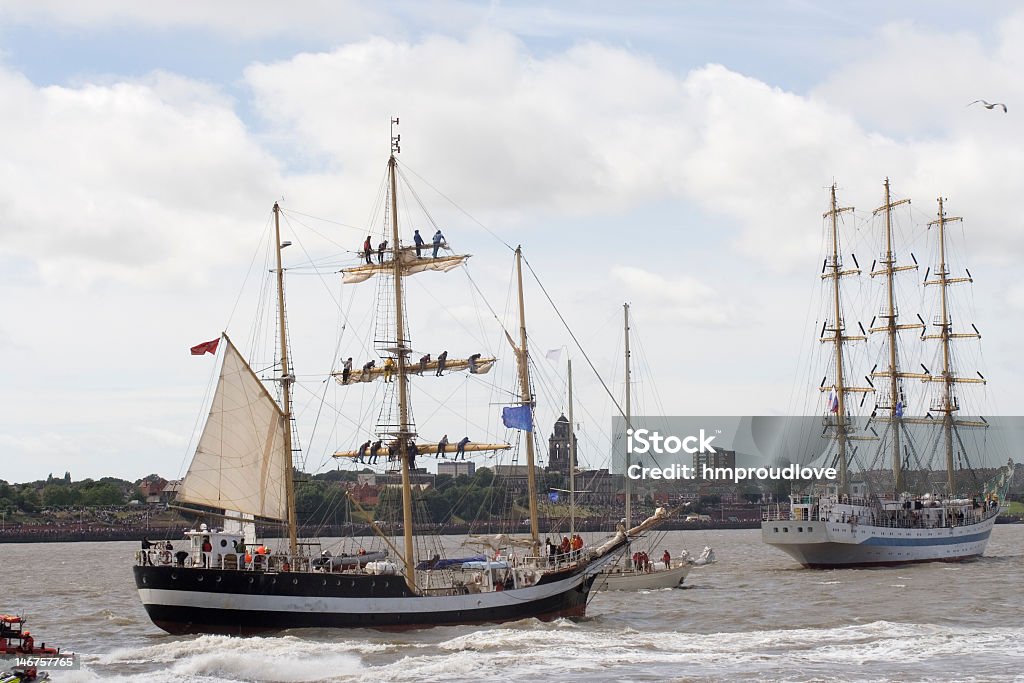 Tall ships Tall ships leaving in the Mersey at the beginning of the race Birkenhead Stock Photo