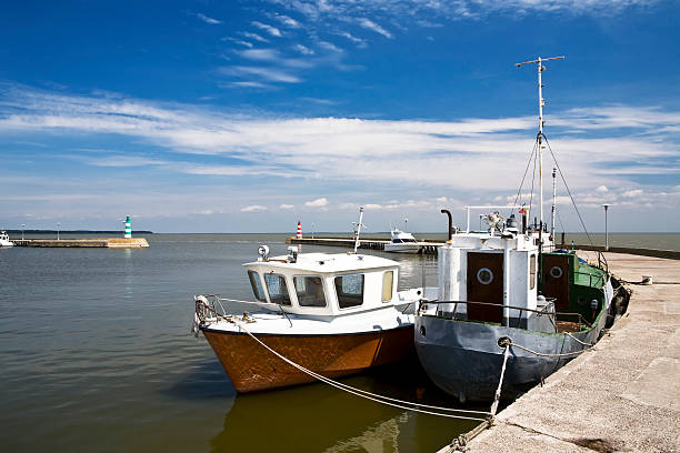 istock Boats at seawall 146757766