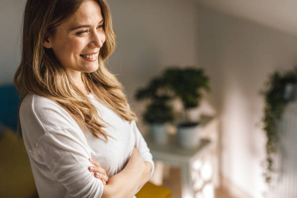 istock Young female professional feeling accomplished with crossed arms 1467579464