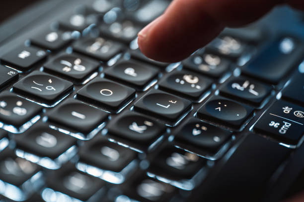istock Close Up of Finger Tapping Computer Keyboard 1467581209