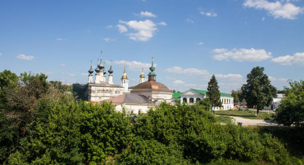 istock historical architecture with temples among green trees with lush foliage on a sunny summer day in Suzdal 1467584467