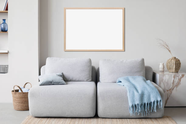 istock Artwork mockup in interior design. Blank wooden picture frame on a wall. Horizontal orientation 1467584630