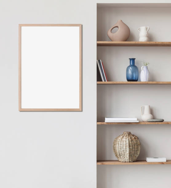 istock Artwork mockup in interior design. Blank white picture frame on a wall. Vertical orientation 1467584705