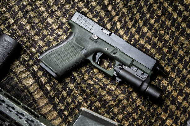 istock Semi-Auto Pistol , Shooting the 9 mm pistol cartridge. 1467587521