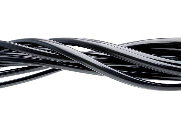 istock Black wires twisted together on white background 146758756