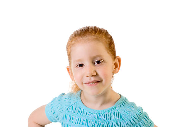 istock Friendly redhead elementary age girl in blue top 146758880