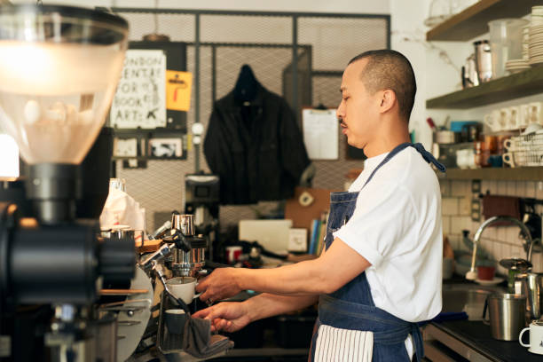 istock Young Asian barista making ice coffee. 1467591365