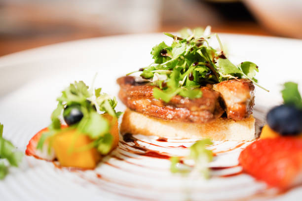 Goose liver with toast and fruit