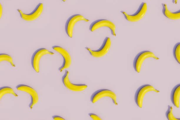 istock an abstract background consisting of banana patterns on a pastel background. 3D render 1467593722