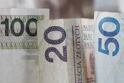 Polish money. Polish zloty banknotes placed next to each other can be used as illustrations for many various financial issues. PLN currency.