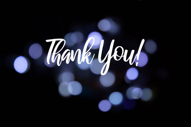 istock Background with the words Thank you! on a blurred light background 1467597383