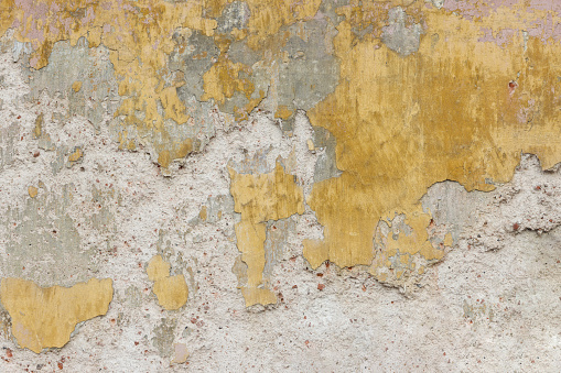 Yellow concrete wall with copy space